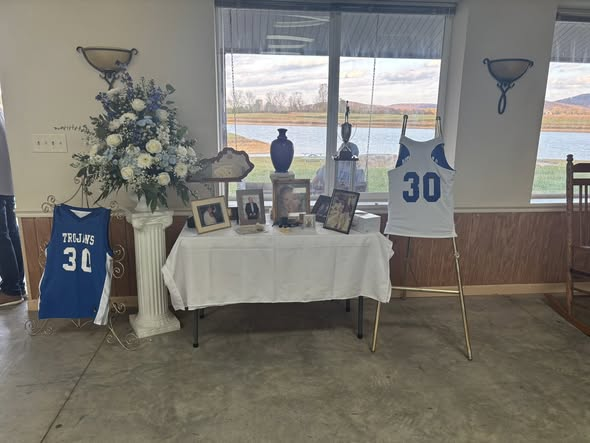 Indoor event space at Cave Lake with lake views through tall windows